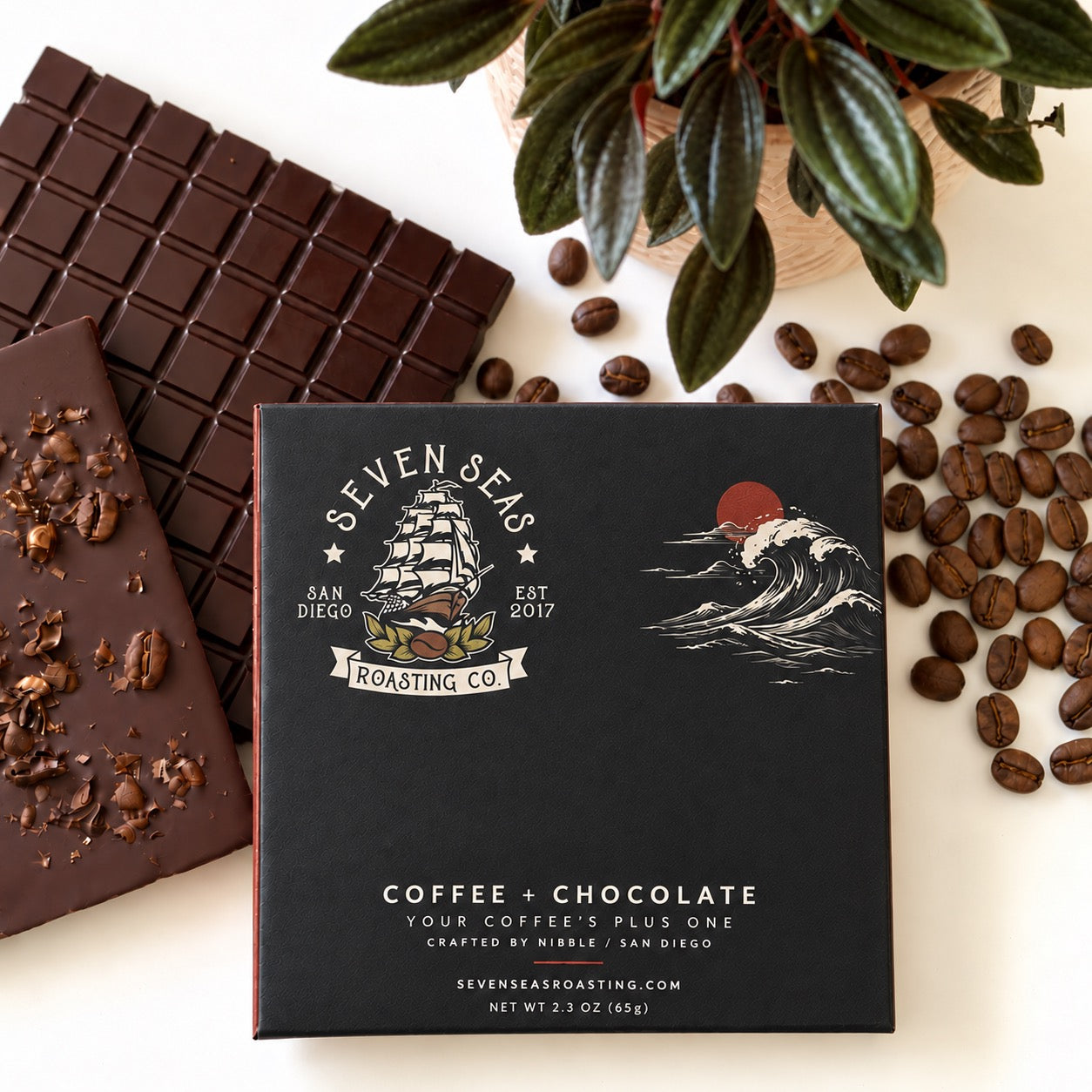 Seven Seas coffee and chocolate custom packaging with chocolate bars and coffee beans
